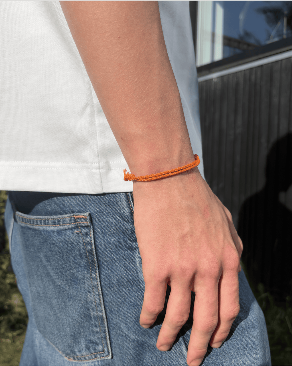 Justerbart Orange Armbånd