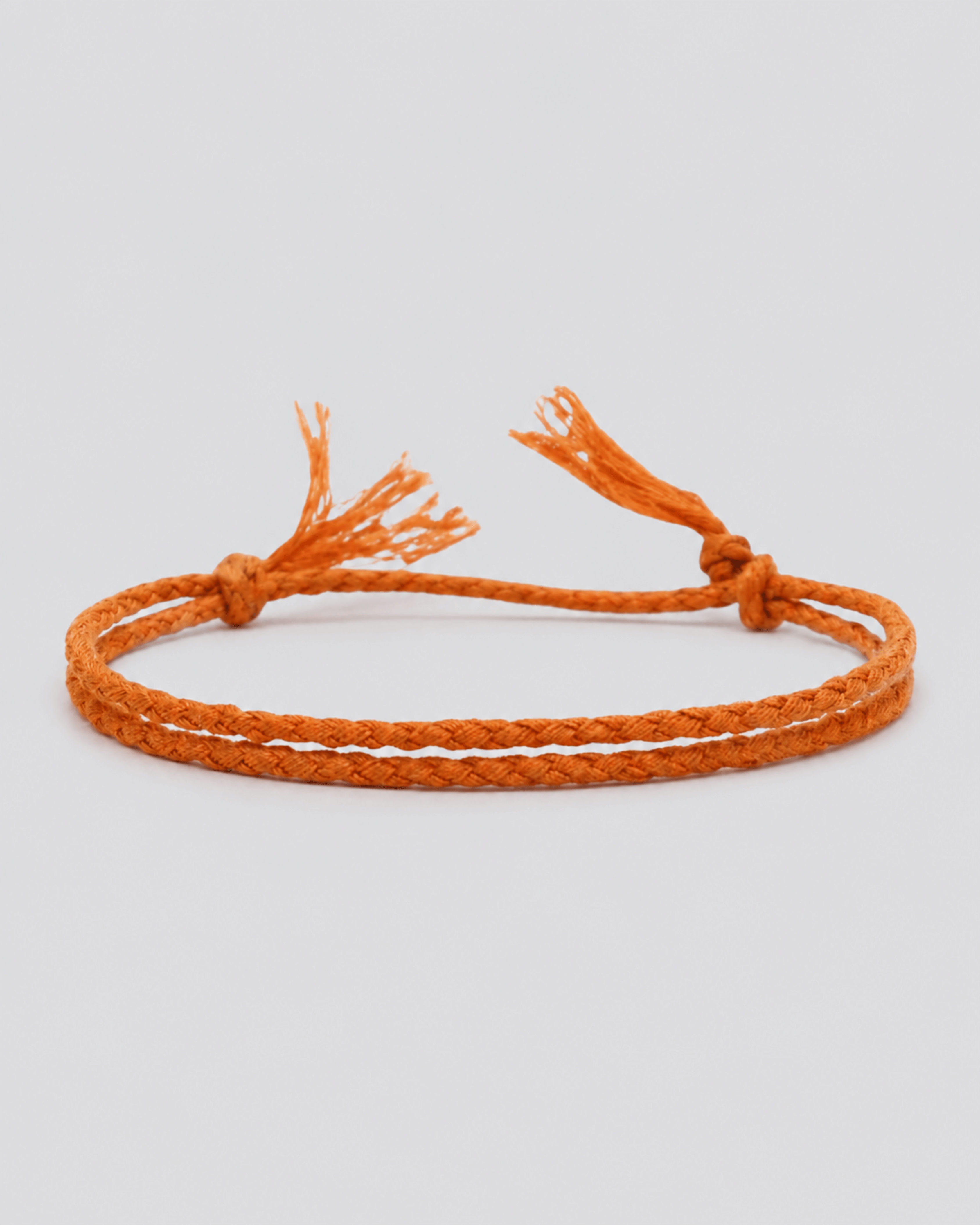 Justerbart Orange Armbånd