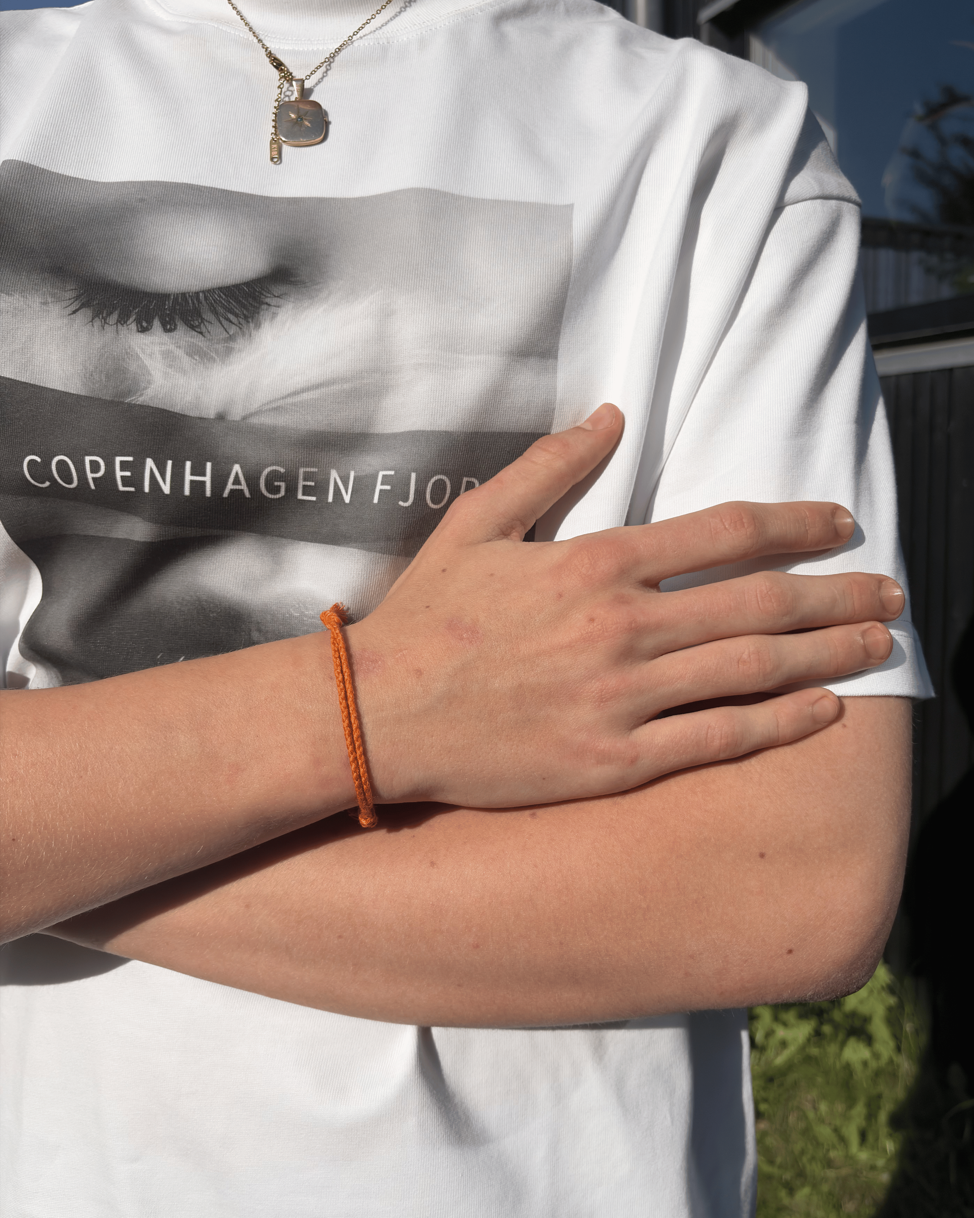 Justerbart Orange Armbånd