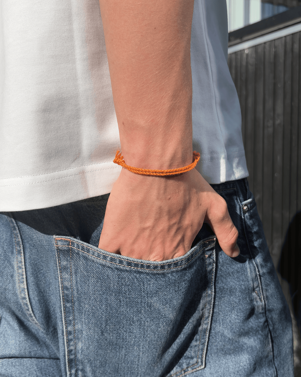 Justerbart Orange Armbånd